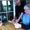 Jill's mom, Cheri, is seen here wearing puppet hands and arms for a close-up shot. In show 13, Fred needs to do a little knitting, so Cheri is Fred's "stunt double" for the scene. Yes, it's difficult to knit this way!